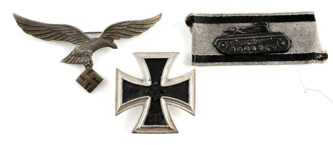 3 WWII GERMAN REICH IRON CROSS LUFTWAFFE PILOT: Lot features an Iron Cross, a Luftwaffe pilot eagle, and a panzer destruction award patch. Good condition. Measurements range 1 5/8 - 3 1/4 inches. Unauthenticated, sold as is. This lot has a reserve.