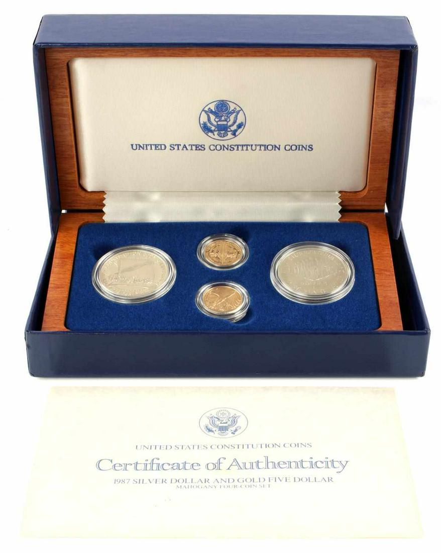 1987 UNITED STATES CONSTITUTION SET W 2 GOLD COINS: As issued by the U.S. Mint with 2, .267 OZT 90% purity $5,00 gold coins, West Point mint, with silver dollars, in proof and uncirculated.