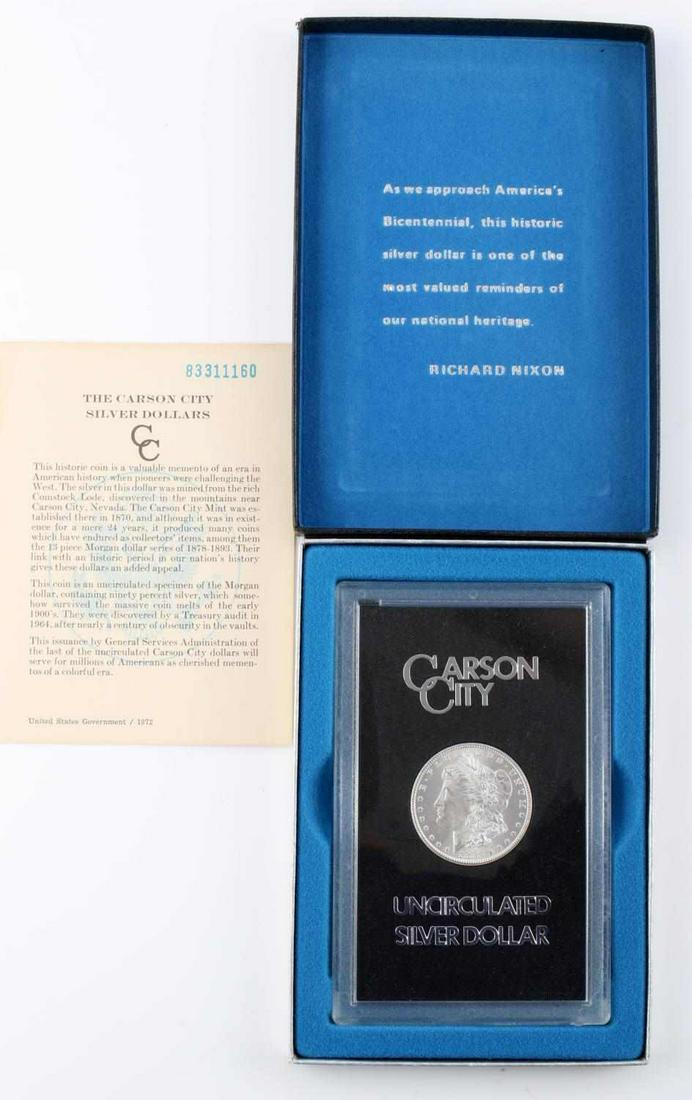 1883CC CARSON CITY GSA UNCIRCULATED SILVER DOLLAR: 1883 Carson City silver dollar in holder and box with certificate of authenticity.