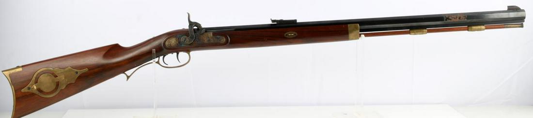 INVESTARM BLACK POWDER .45 CAL PERCUSSION RIFLE: Muzzle loading rifle, percussion cap. .45 caliber; 28 inch octagon rifled barrel; double set triggers; Bright and clear bore. adjustable or fixed rear sight; walnut stock. standard brass patchbox engr