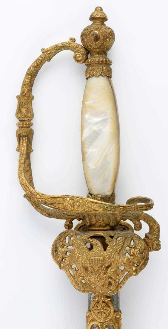 US M1898 PRESENTATION SWORD NAMED CAPT ALBERT EBER: U.S. model 1898 presentation sword named to Captain Albert Eber who was a member of the 35th Michigan Infantry, all of which is etched onto the blade. Maker's marked "Morgan Puhl & Morris Detriot Mich