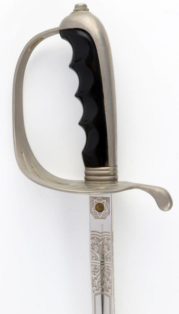 U.S. ARMY MODEL 1902 WWI PERIOD SWORD W SCABBARD: U.S. Army model 1902 sword with scabbard. WWI period. Etched "US" with the U.S. Army eagle. Maker's marked "Trade Spartan Mark N.S. Meyer Inc. West Germany" on the base of the blade with the proof med