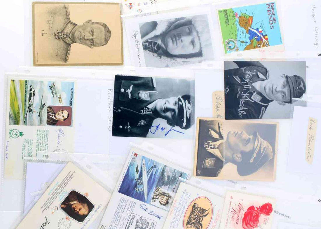 20 VARIOUS GERMAN WWII LUFTWAFFE SIGNATURES: Twenty (20) signatures of various German WWII Nazi Luftwaffe pilots, officials and aces. Some with Iron Cross recognition. All in sheet protected, great condition. Some signatures include photos of in