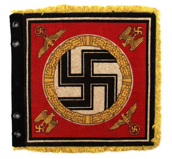 HITLER 1942 STAFF PARADE CAR PENNANT: A 7X7 heavy canvass superbly detailed Automobile personal flag pennant of Hitler accompanied by photograph with identical piece on Hitler's Parade car .