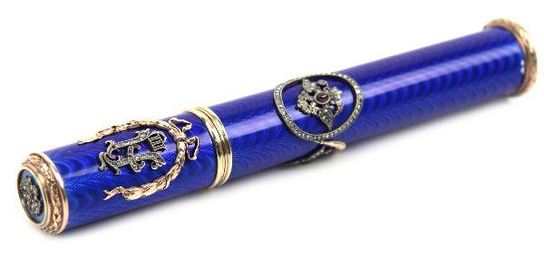 FABERGE STYLE IMPERIAL RUSSIAN CIGAR CASE: A wonderful enameled cigar holder in Faberge style. On the front is the escutcheon of Tsar Alexander III in a large 'A' with a golden wreath around it. In the section below are three beautiful double-