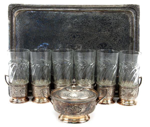 TURKISH .840 SILVER COFFEE SET & TRAY: 20th C. A collection (6) 2 inch silver glass insulators with handles and glasses, a 2.5x4.5 inch lidded sugar bowl marked with the Iranian 84 standard mark, and a 14x10 inch tray. All pieces are heavi