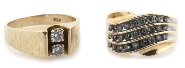 MENS 14K YELLOW GOLD & DIAMOND RINGS-LOT OF 2: Size 8.5 ring with (3) rows of channel set diamonds ranging in size from 0.03 ct to 0.06 ct. Size 11 ring with (2) approximately 0.25 ct round cut diamonds. . Size: 8.5 & 11 . Weight: 15.8 . Condition