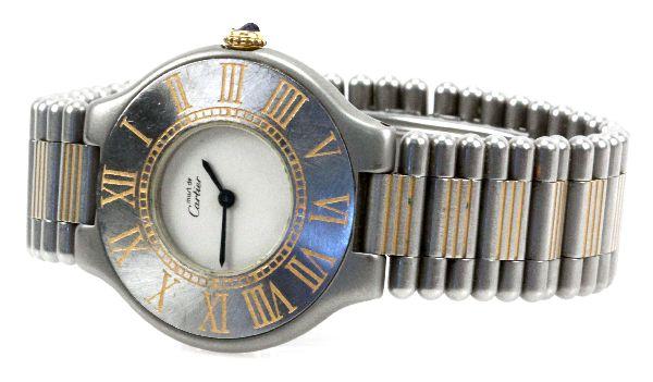 LADIES MUST DE CARTIER 21 18K & STAINLESS WATCH: Sn 901067715. Includes box, COA, manual, and extra links. Movement: Quartz Case: 40mm stainless steel Band: 5.5 inches Face, Dial, Hands: White face with blue hands and gold tone Roman numerals. Condi