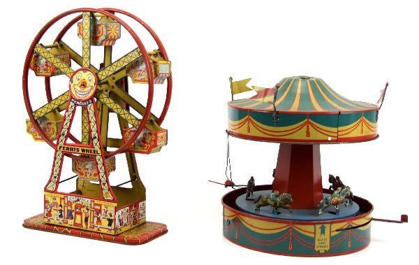 WOLVERINE MERRY-GO-ROUND W/ HERCULES FERRIS WHEEL: A 1930's 10x11 inch Wolverine No. 31 Merry-go-round tin toy with a 17x11 inch Chein wind-up Hercules Ferris Wheel. Both pieces are in good condition with the Merry-go-round missing one flag and severa
