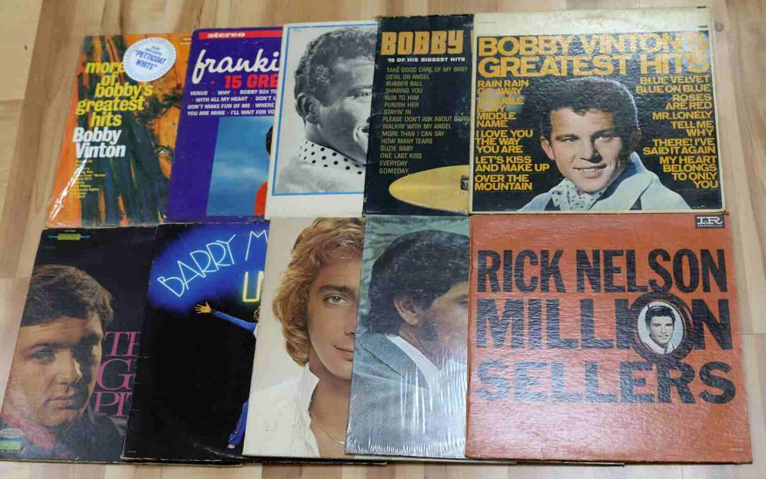 10 ASSORT 60S 70S 80S FAMOUS SINGERS VINYL RECORDS: Lot of 10 assorted 60's, 70's, and 80's famous singers vinyl records. Rick Nelson "Million Sellers", Engelbert Humperdinck "Release Me", Barry Manilow "Greatest Hits", Barry Manilow Live, Gene Pitney 