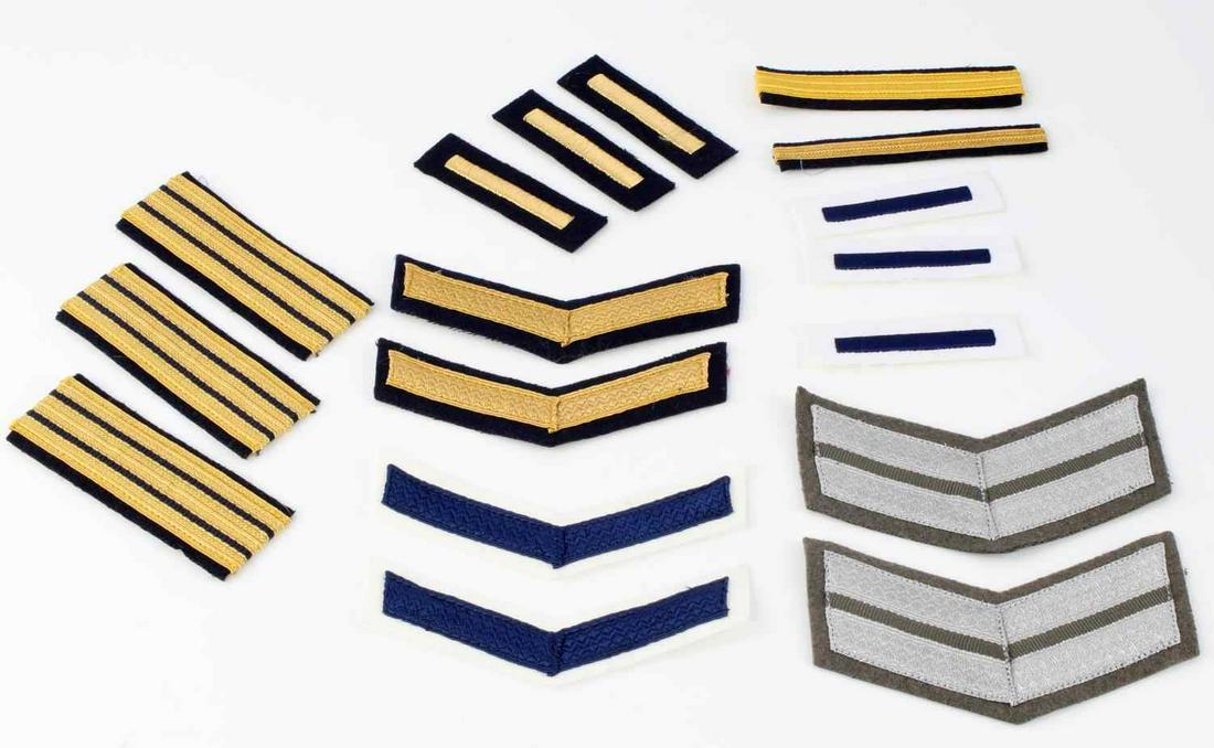 COLD WAR EAST GERMAN ARMY NAVAL RANK PATCH LOT: Single bar ranks, chevrons, and Naval sleeve patches. Bullion and cloth construction. Very good condition.
