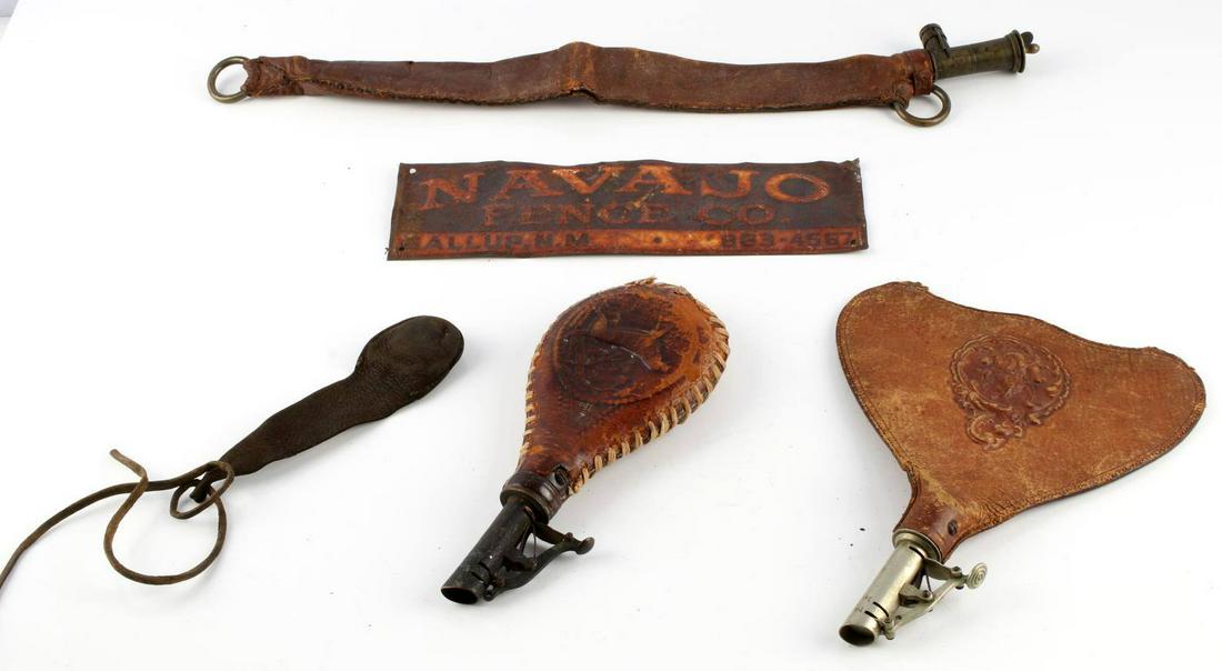 4 ANTIQUE LEATHER FLASK WITH NAVAJO FENCE SIGN: Lot includes 4 leather flask for powder and a Navajo Fence Co sign. Measurements range 8 1/2 - 19 1/2 inches.