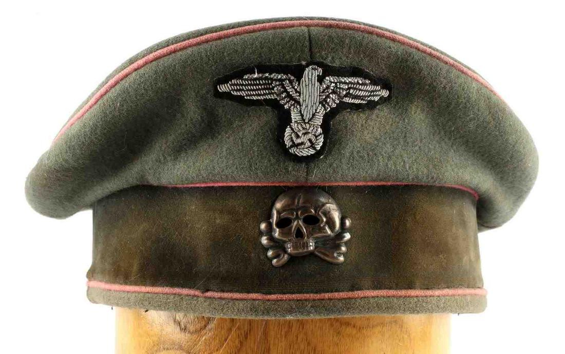 WWII GERMAN THIRD REICH SS PANZER VISOR HAT: German SS Panzer Visor with no visor. SS symbol on the inside, size 57. Leather liner, torn and detached in some spots, Reichsadler and Totenkopf near-excellent condition. Does not fluoresce under bla