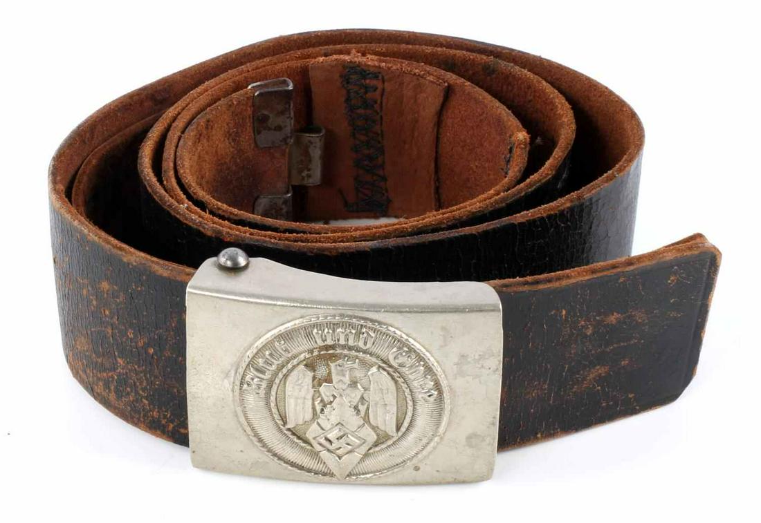 WWII GERMAN HITLER YOUTH HJ BELT AND BUCKLE: WWII German Hitler Youth HJ belt and buckle. Brown leather belt with a black front side. HJ belt buckle featuring Reichsadler with "Blut und Ehre". Reverse marked RZM Ges. Gesch. 40 inch belt. Crackin