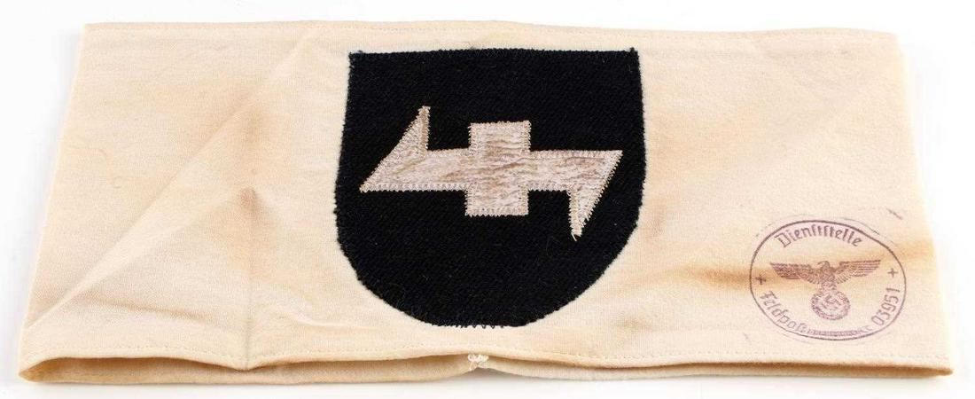 WWII GERMAN REICH DAS REICH SS DIVISION ARMBAND: WWII German Reich "Das Reich" SS division armband in good condition, interior reads "Hauptsitz Division Inspiziert 1945". "Wolfangel" design on front does fluoresce and/or reflect; although stitching 