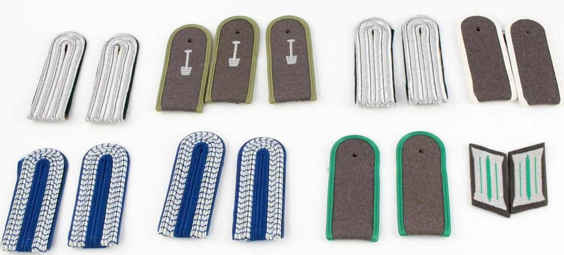 WWII GERMAN MILITARY SHOULDER BOARD LOT 7 PAIRS: Lot includes: two blue and white pairs, two silver bullion with green piping, one pair of grey with light green piping (plus one extra), pair of grey with white piping, and pair of grey with bright gr