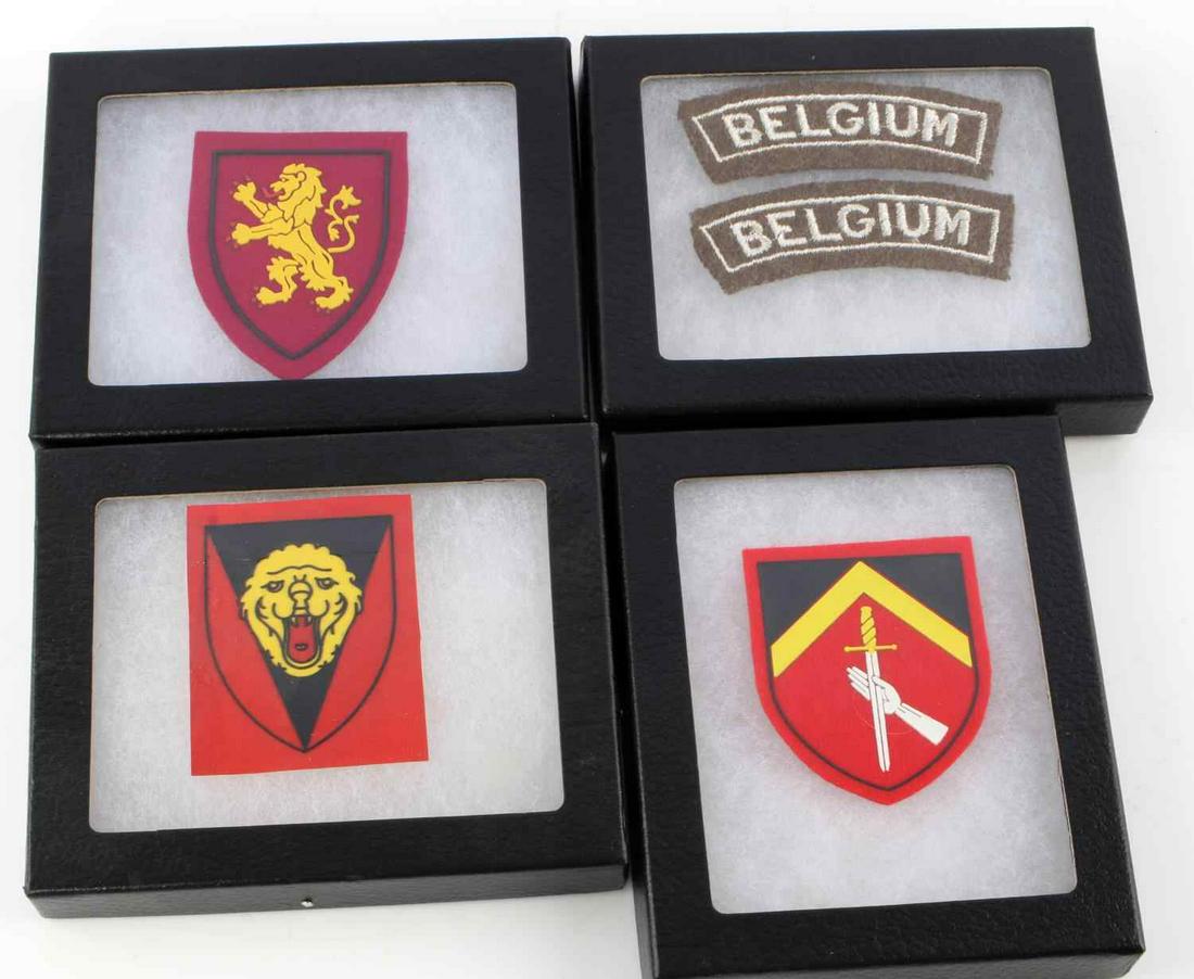 WWII BELGIAN THIRD REICH LOT OF 5 PATCHES: Patch from the 3rd military district, patch from 2nd army corps. Post WWII 2nd infantry division shoulder patch. WWII Army uniform shoulder arc set of 2. All near excellent conditions with display cas