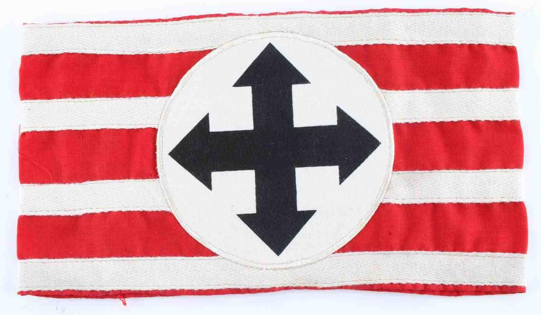 GERMAN WWII WAFFEN SS HUNGARY HIGH LEADER ARM BAND: Measures 9 x 5 inches. Front shows four crossed arrows in center of round circle. Sewn onto red rectangle arm band with four white horizontal stripes. Multi Piece machine sewn and cotton construction.