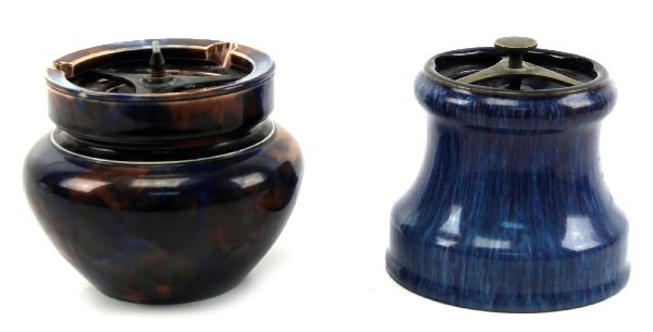 PAIR OF COBALT BLUE LIDDED IRONSTONE TOBACCO JARS: Two ironstone tobacco jars with thumb screw lids Both pieces measure approximately 4.5 inches in height. Cobalt blue piece marked "PATENT No. 303679". Blue tortoise shell piece is unmarked and has two