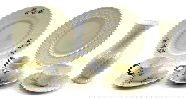 LOT OF 9 PIECES OF BELLEEK FINE CHINA: Included is a luncheon set (cup,saucer and plate) in shell pattern with green makers marks, a luncheon set in basket pattern with shamrocks with early green marks, a creamer and under plate in basket