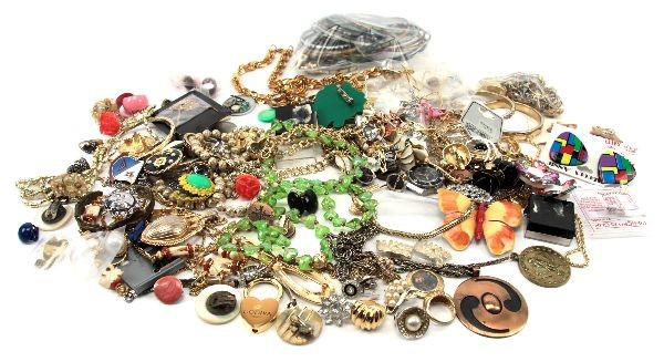 LARGE COSTUME JEWELRY LOT- GOLDETTE GIVENCHY: A large grouping of vintage costume jewelry, including: a pair of Givenchy clip-on earrings, a Goldette NY locket, (2) pairs of Stannard earrings, several Marvella pieces, a grouping of Asian inspired