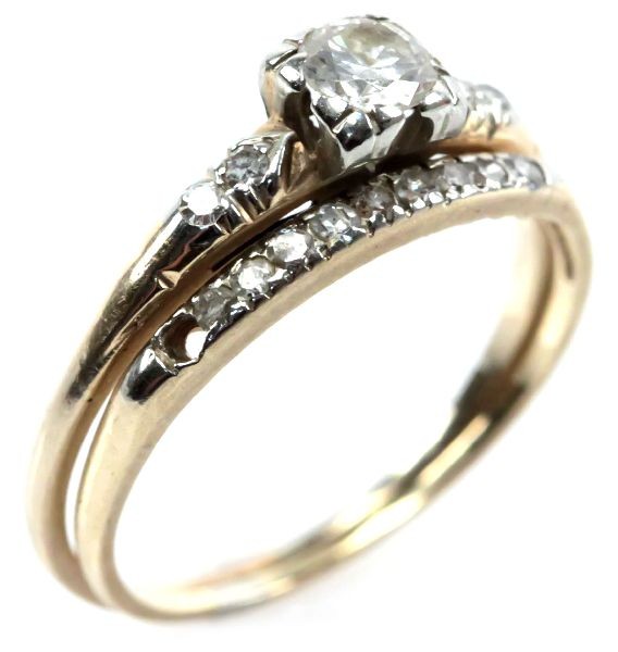 LADIES 14K YELLOW GOLD DIAMOND WEDDING SET: Approx. 0.5ct round cut center diamond engagement ring with (4) round cut flush set diamond accents. Wedding band with (9) round cut flush set diamonds equaling roughly 0.14 ctw. . Size: 7 . Weight: 2