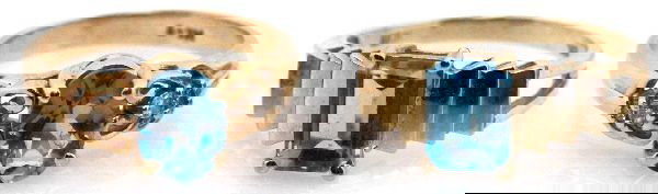 LADIES YELLOW GOLD & AQUAMARINE RING LOT OF 2: Size 6 14K gold band with approximately 1.1ct oval cut aquamarine in a four prong setting with (4) accent diamonds. Size 7 10K gold art deco style band with an approximately 1.1ct emerald cut aquamari