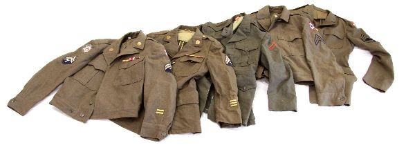 WWII ARMY USMC IKE JACKETS AND TUNICS: A box of 3 WWII Ike jackets and a Army tunic and a USMC tunic torn, the army group retains patches ribbons and rank insignia up to first sergeant .All are small sizes 38 to 42.