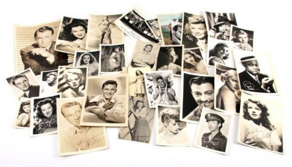 VINTAGE HOLLYWOOD AUTOGRAPHED PRESS PHOTOGRAPHS: VINTAGE HOLLYWOOD AUTOGRAPHED PRESS PHOTOGRAPHS Over 30 vintage Hollywood press photographs received between the 1940's and 1980's. Signed photographs include: Gene Autry, Penny Singleton, Jack Haley,