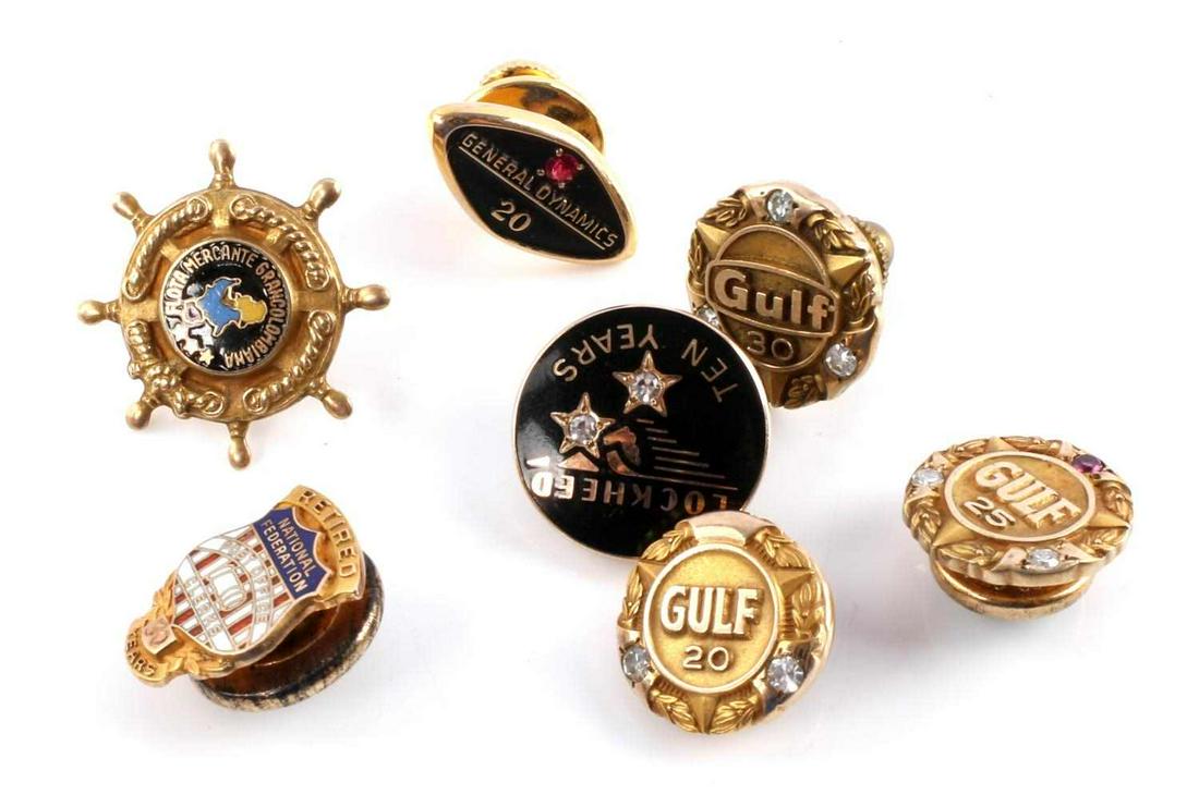 7 ASSORTED 10K GOLD PIN GULF GENERAL DYNAMICS LOT: An assortment of 7 gold pins including General Dynamics, Gulf Oil, Post Office, and other companies. All in very good condition marked 10K-14K. 17 grams.