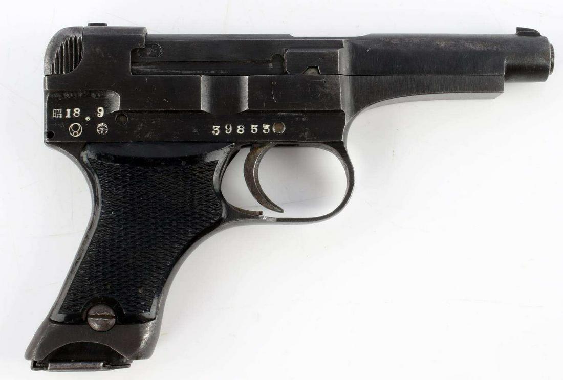 WWII JAPANESE TYPE 94 NAMBU SEMI AUTO 8MM PISTOL: WWII Japanese Type 94 Nagoya Semi Automatic 8mm Caliber Pistol, serial number 39853. Barrel measures approx. 4 inches, with bore being bright and clear, chambering in 8mm Nambu. Receiver is marked wit