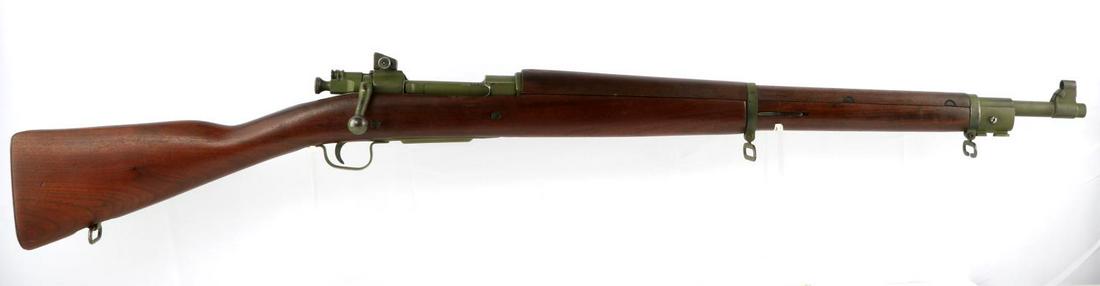 WWII US REMINGTON 03 A3 BOLT ACTION RIFLE .30 06: WWII military rifle, clearly marked at top, R A flaming bomb 6-44 marked near muzzle end with P marked on reverse, flat green paint, walnut stock, bayonet lug, and stacking swivel. Barrel measures 25 