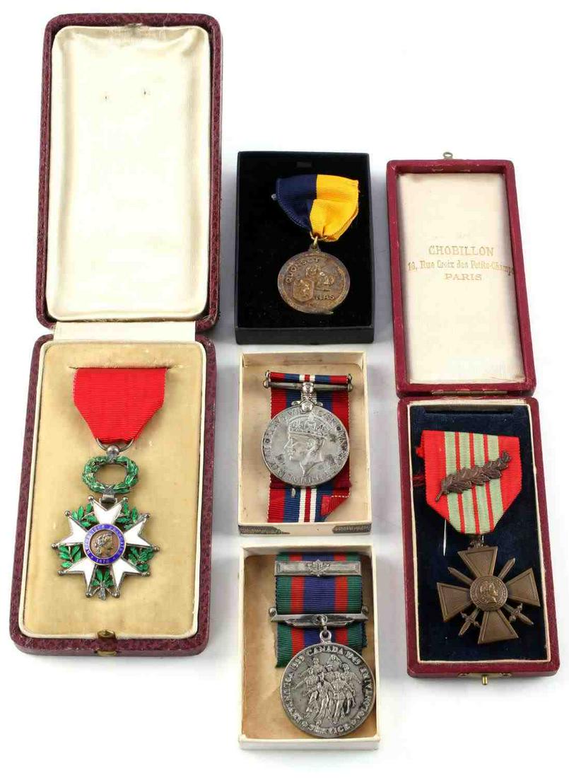WWII FRENCH CANADA US BRITISH MEDAL LOT: Includes boxed French Legion of Merit, boxed Croix De Guerre, British war service, unamed but original box has written Melos Sorokopus written in ink, WWII Quonset NAS in New York sterling football me