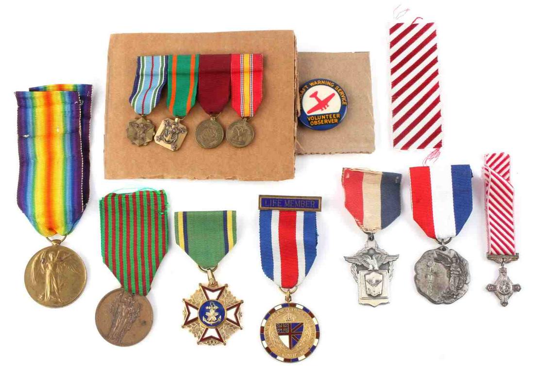 12 WWI PRESENT ASSORTED WORLD MILITARY MEDAL LOT: Included is a WWI Australian Victory medal named to Private W. Parsons of 3rd S.A.I. with non-fluorescing ribbon. Patination present to both medal and ribbon. Other items are British and American awar