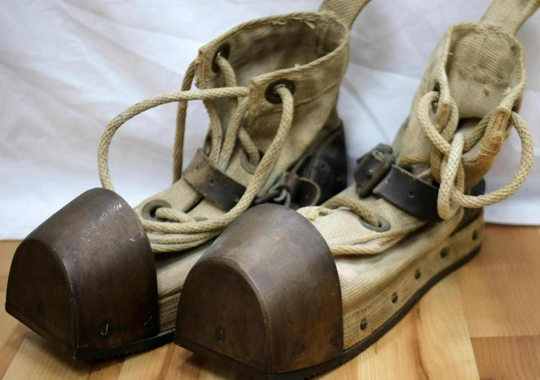 WWII US NAVY DEEP SEA DIVING DIVERS BOOTS: WWII United States Navy deep sea diving lightweight brass divers boots. Canvas body, leather strap, rope string, wood sole, brass toe, and brass bottom. Leather intact with signs of use and age. Overa