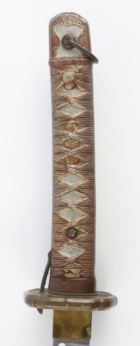 WWII TYPE 95 ARMY NCO JAPANESE SWORD NAGOYA: WWII type 95 Army NCO Japanese sword, Nagoya arsenal measures 38 inches in scabbard with a 27.5 inch blade and 9 inch handle. Stainless steel blade in very good condition with no major damage. Brass t