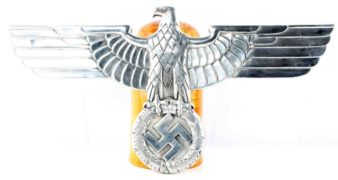 WWII GERMAN THIRD REICH BOX CAR RAILWAY EAGLE: Third Reich Railway eagle wall mount. Reverse marked DS LOK 680 GAL - Mg-Si. Measures 26 x 13 inches. Good condition. Aluminum construction. This lot has a reserve.