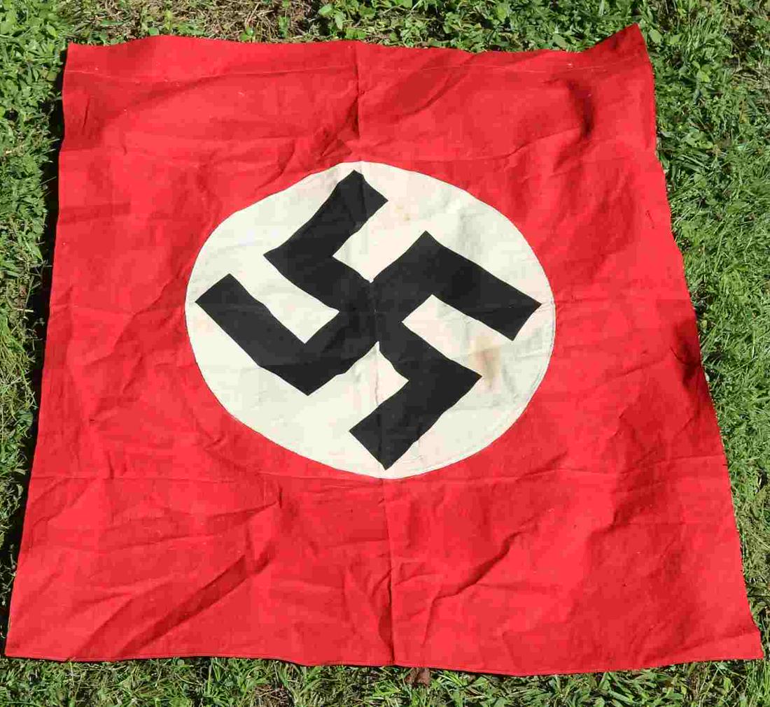 WWII GERMAN THIRD REICH NSDAP PARTY EMBLEM FLAG: WWII German Third Reich NSDAP party emblem flag, approx. 38 X 30.5 inches. Minor discoloration, staining and creasing. Single hoist, multi-piece and with a double sided display. Non-fluorescent. Very 