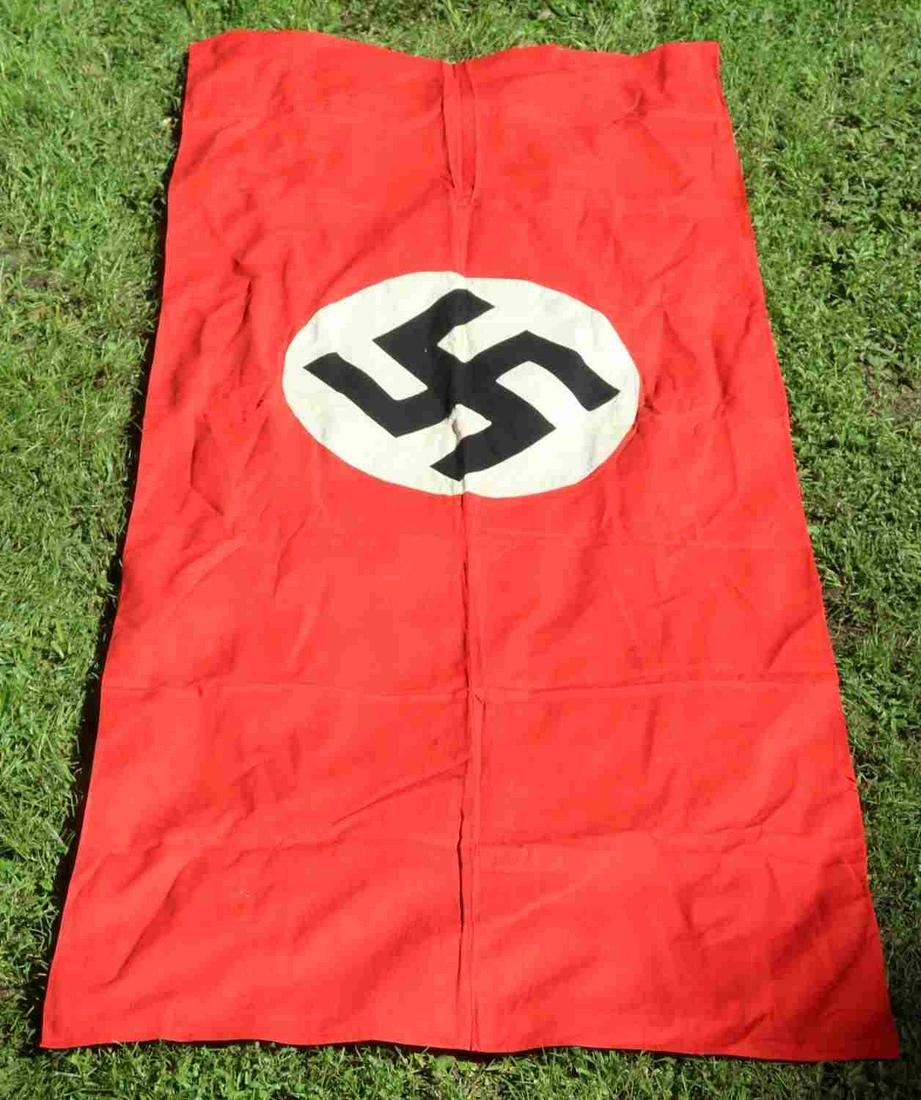 WWII GERMAN THIRD REICH NSDAP PARTY EMBLEM BANNER: WWII German Third Reich NSDAP party emblem banner, measures approx. 71 X 31 inches. Minor discoloration and staining on center emblem. Double sided display, single hoist, multi-piece and non-fluoresce