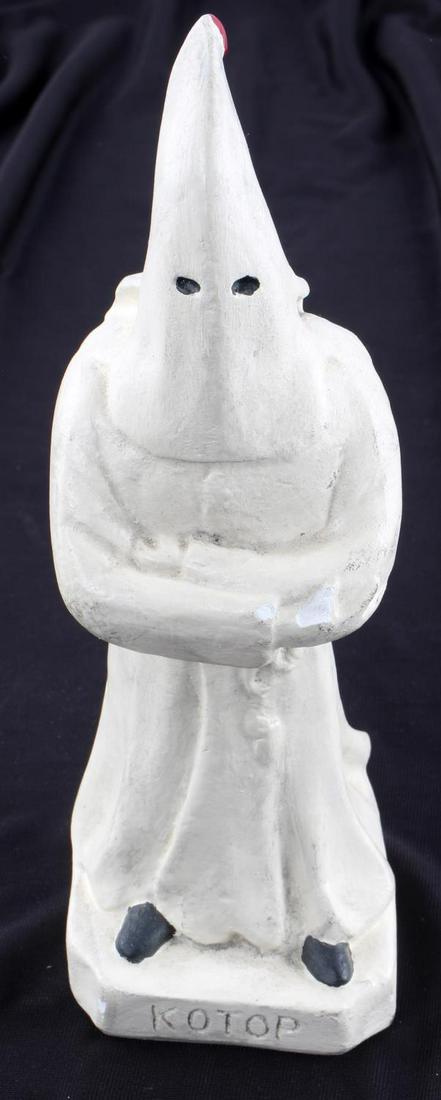 SECOND GENERATION KKK CHALKWARE FIGURINE STATUE: KKK hooded figure from 1923. KOTOP on front for Knights of the Open Palm and copyright 23 on reverse. Measures 8 inches. Good condition.