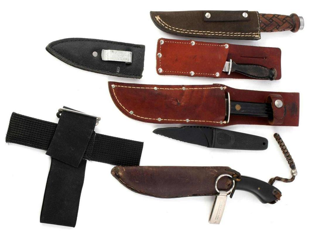 LOT OF 5 FIXED BLADE KNIVES WITH SHEATH KNIFE: 1 solid plastic fishing knife, 1 bakelite grip knife with 5 inch blade and leather sheath, 4 inch blade with leather sheath, 5 inch blade with leather sheath, 5 inch blade with leather sheath.