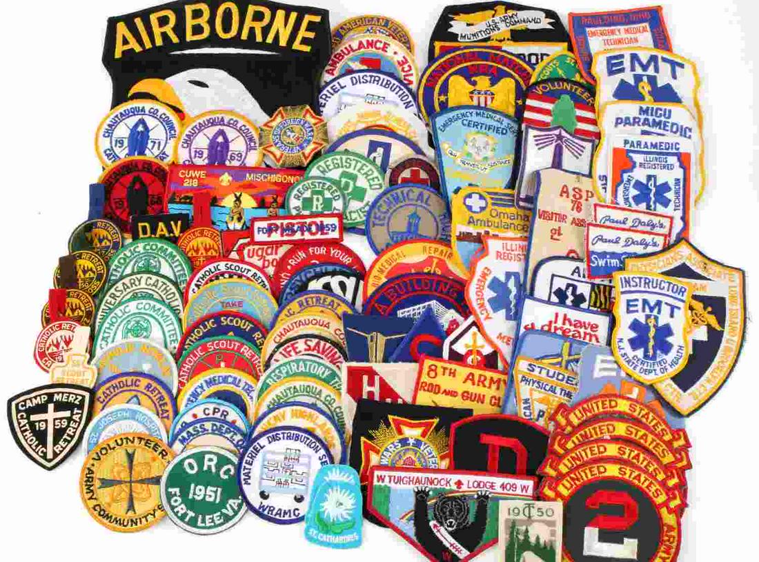 LOT OF 89 MISC PATCHES MILITARY CATHOLIC MEDICAL: 36 circular patches, 3 boy scouts catholic committee, 13 cloth and felts, 4 second united states army commanders matches 1961, 1962, 1964, 1965. 10 rectangular patches, 22 misc shape patches. Some mil