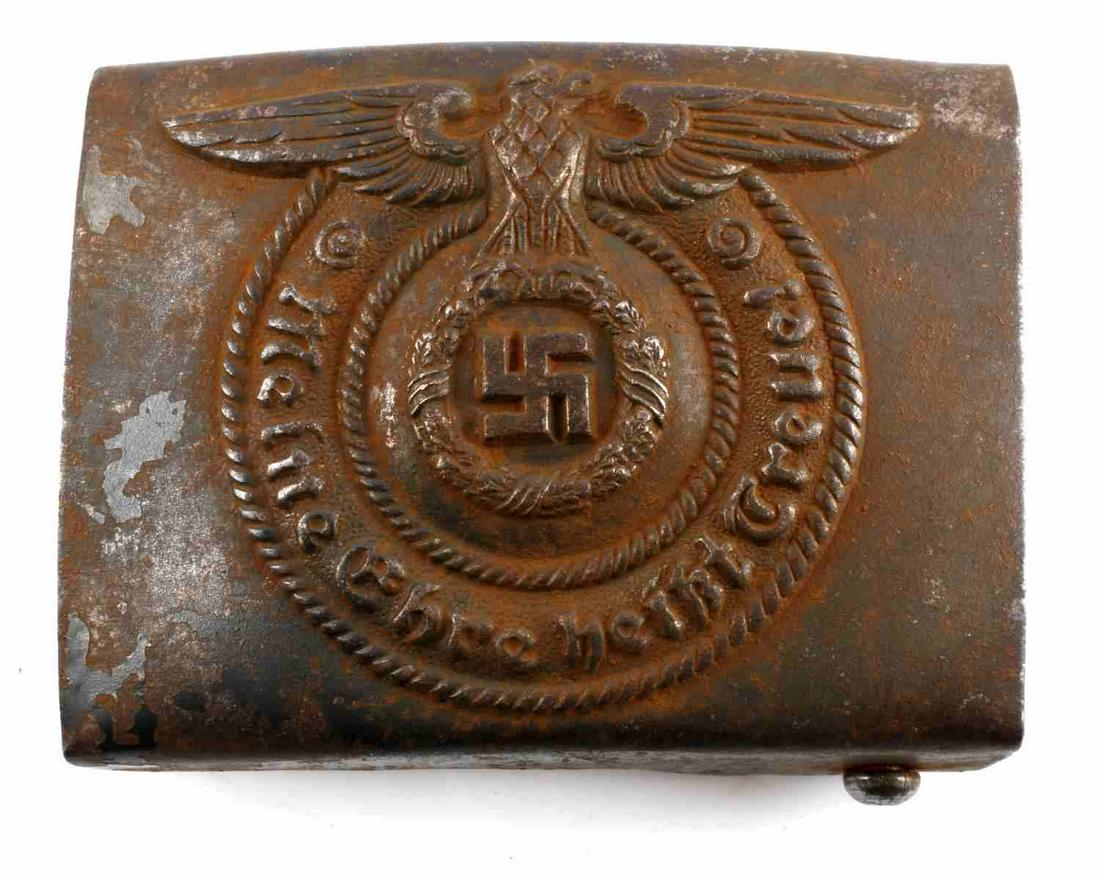 WWII GERMAN THIRD REICH WAFFEN SS BELT BUCKLE: WWII German Waffen SS belt buckle. Maker's marked "RZM 155/50 SS" on the reverse. Measures 2 X 2.75 inches. Very good condition overall with the exception of some light patina to the front and back of