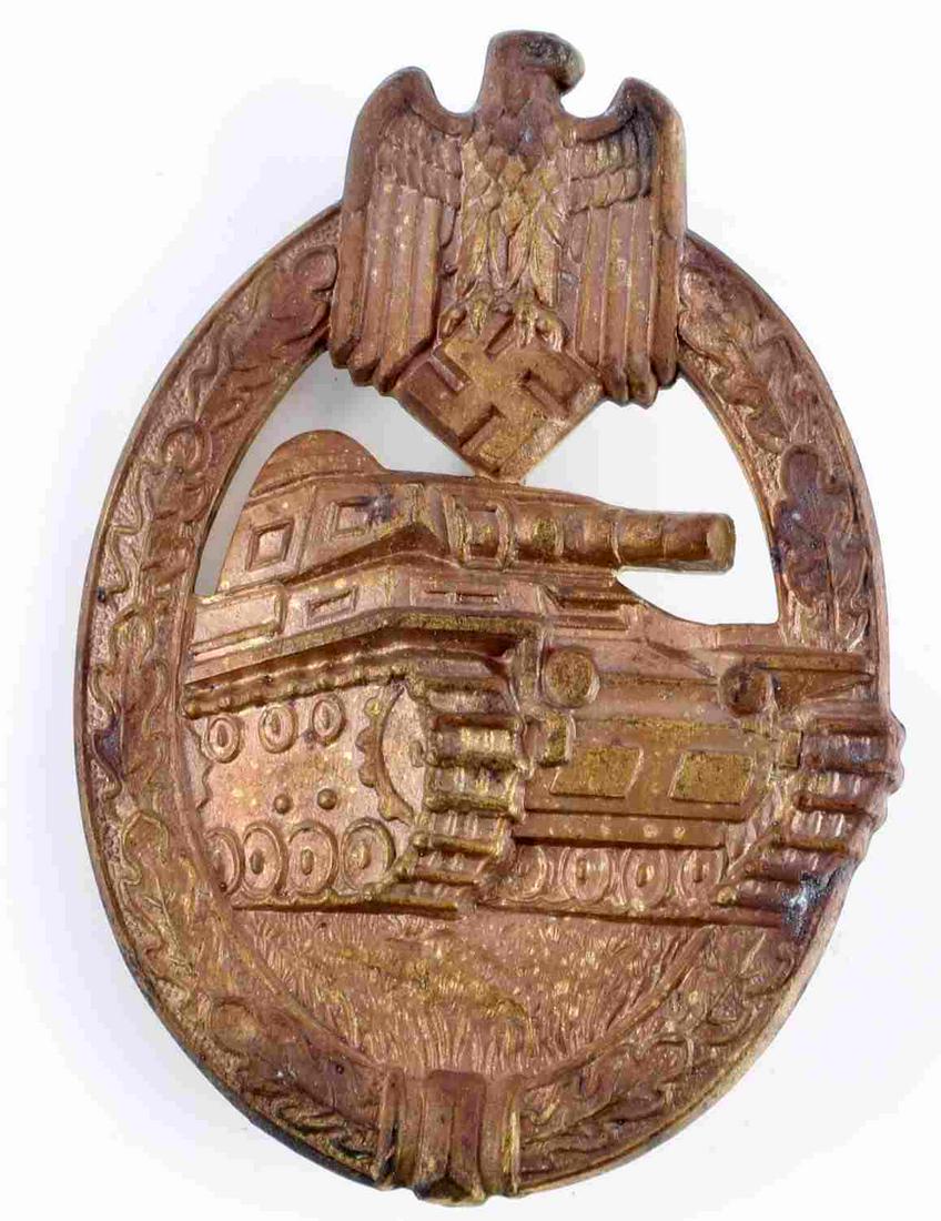 WWII GERMAN THIRD REICH BRONZE PANZER TANK BADGE: Third Reich bronze tank badge. Reverse marked R S & S. Pin lays 180 degrees. Measures 2 1/4 inches. Unauthenticated, sold as is.