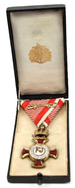AUSTRIA GOLD CROSS OF MERIT FRANZ JOSEF 1849: 1849 Cross of Merit in gold with crown and crossed sabers on ribbon with original box.