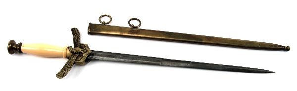 ITALIAN AIR FORCE DAGGER WITH DOUBLE-ETCHED BLADE: Italian Air Force dagger with double-etched 12 inch blade. Large outstretched eagle front and obverse of cross guard. Brass scabbard with two hanger rings. Celluloid-over-wood grip in good condition. 