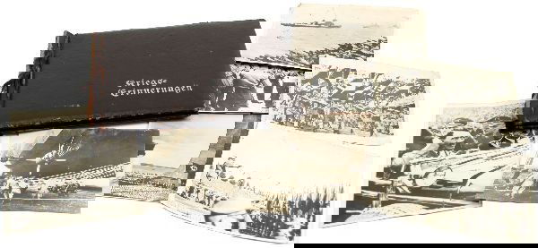 GERMAN WWII PERSONAL PHOTO SCRAPBOOK: Mounted in an original "Kriegs= Erinnerungen" album. Many candid photos of army life in the German army. Most are 2.5x3.5 inch size. Also included are several 7x9 inch loose press photos. Good conditi