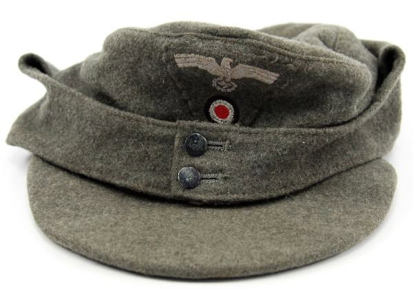 WWII GERMAN M-43 WEHRMACHT NCO FIELD CAP: A Third Reich M-43 NCO's wool Wehrmacht field cap. It is free of mothing and overall, very good condition.