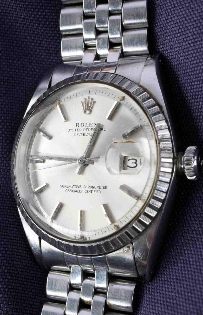 MENS STAINLESS STEEL ROLEX DATEJUST PARTS: Men's Rolex Datejust with stainless bracelet. Watch is running but crown is unable to be screwed back in and needs to be replaced. Serial number 155228. Has been inspected for authenticity. The band r