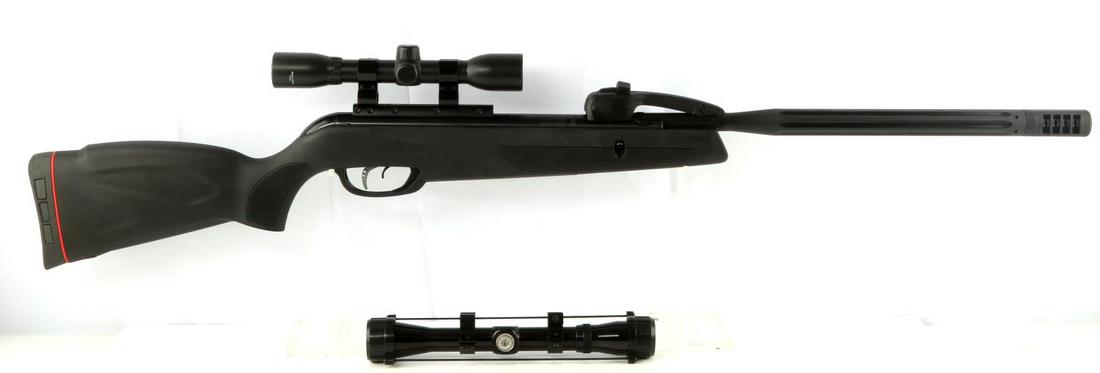 GAMO SWARM MAXXIM .177 BREAK BARREL AIR RIFLE: Pellet air rifle includes two (2) scopes. Good overall condition with light wear. Fog and waterproof objective scopes with lens caps and shock wave absorber recoil pad. Made in Spain.